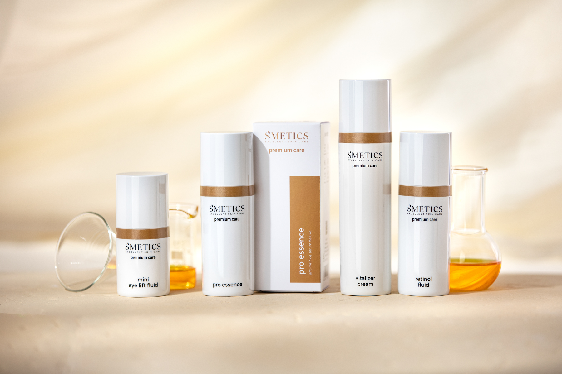 premium care Hautpflege von S’METICS Premium care skincare products from S’METICS, including Pro Essence, Vitalizer Cream, Retinol Fluid, and eye care
